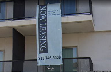 Photo 3: Haroni Property Now Leasing Sign